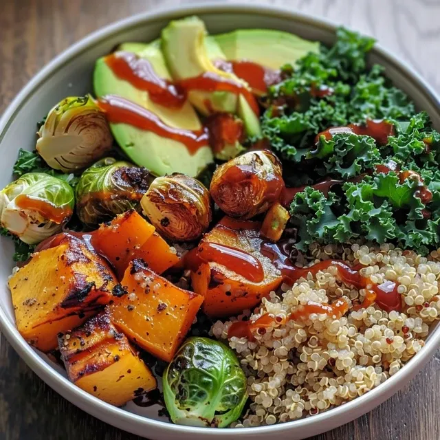 Fresh ingredients in a quinoa bowl, showcasing Brussels sprouts, butternut squash, and kale.