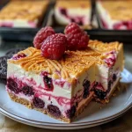 ['Close-up of Berry Swirl Cheesecake Bars with vibrant berry topping.', 'Side view of creamy cheesecake bars with a berry swirl on top.', 'Delicious Berry Swirl Cheesecake Bars displaying a colorful raspberry filling.', 'An iPhone 15 Pro shot of cheesecake bars with a rich berry pie filling.']