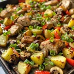 Close up of a juicy turkey veggie bake on a sheet pan.